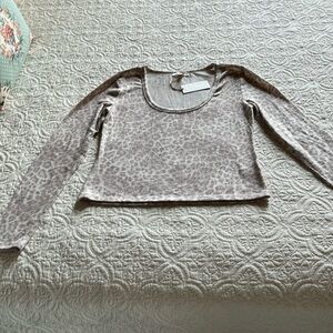 Brand new with tags leopard print long sleeve sweater.